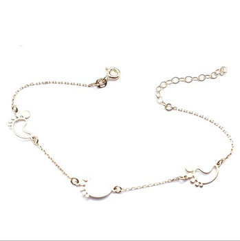 Srebrna bransoletka trzy stópki, ażurowe i pełna stópka pr 0,925 pozłacana 18k złotem